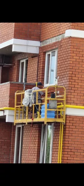 Подъёмник для фасада, люлька. Фасадные люльки.